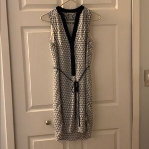 Cute navy & white dress with a slight high low hem